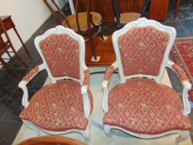 A pair of French salon style chairs