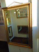 A rectangular gilt framed mirror