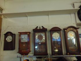 Five assorted wall clocks