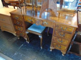 A Walnut dressing table and stool,
