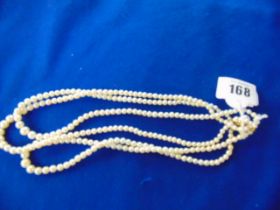 A three row Pearl necklace on 9ct GOld clasp