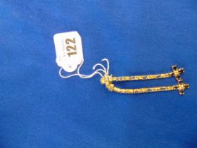 A pair of 18ct Gold multi gem set cross drop earrings
