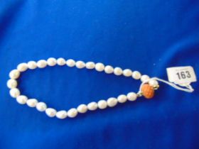 A Georgian Pearl necklace with Coral clasp with large Fresh water Pearls