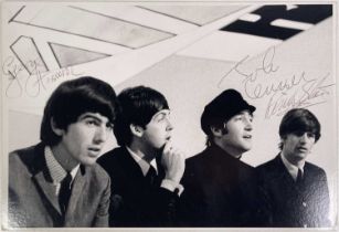 THE BEATLES FULLY SIGNED PHOTOGRAPH.