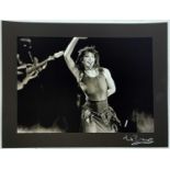 KATE BUSH - PERFORMING 'WUTHERING HEIGHTS' - PHOTOGRAPHER SIGNED HIGH-QUALITY PHOTO PRINT.