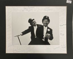 ERIC MORECAMBE AND ERNIE WISE - LARGE PHOTOGRAPH WITH 50+ SIGNATURES FROM STARS OF STAGE AND SCREEN