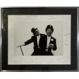 ERIC MORECAMBE AND ERNIE WISE - LARGE PHOTOGRAPH WITH 50+ SIGNATURES FROM STARS OF STAGE AND SCREEN