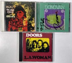 SIGNED CDS INC THE DOORS.
