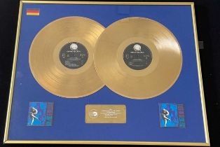 GUNS 'N' ROSES - A PAIR OF ORIGINAL GERMAN GOLD DISC AWARDS PRESENTED TO DIZZY REED.