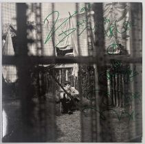 PAUL MCCARTNEY - CHAOS AND CREATION IN THE BACK YARD - SIGNED BY MIKE MCCARTNEY.