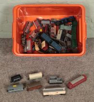 A box of Tri-Ang and Marklin OO Gauge rolling stock to include carriages, tankers, wagons, etc.