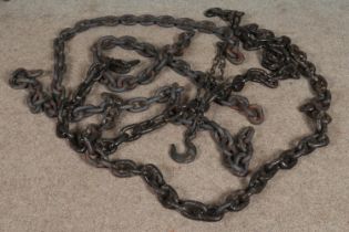 A quantity of large thick cast iron chains