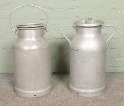 Two aluminium milk jugs, produced by Hugonnet and Schmid, stamped BEL I and CLPS. Tallest example: