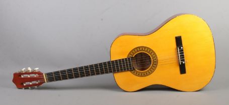 A Herald acoustic guitar, model HL34.