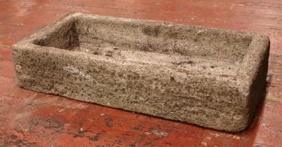 A large concrete garden trough of rectangular form. Height: 19cm Width: 91cm, Depth: 43cm.