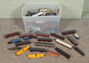 A large box of mostly railway carriages and spares & repairs. Includes motors, bodies, etc.