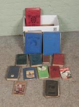 A collection of both vintage and antique books to include Annals of the Poor, The Shark Hunter,