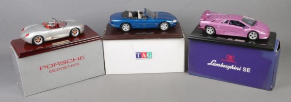 Two Gwilo International Limited and Tag Precision Models diecast vehicles. Includes Jaguar XK8,