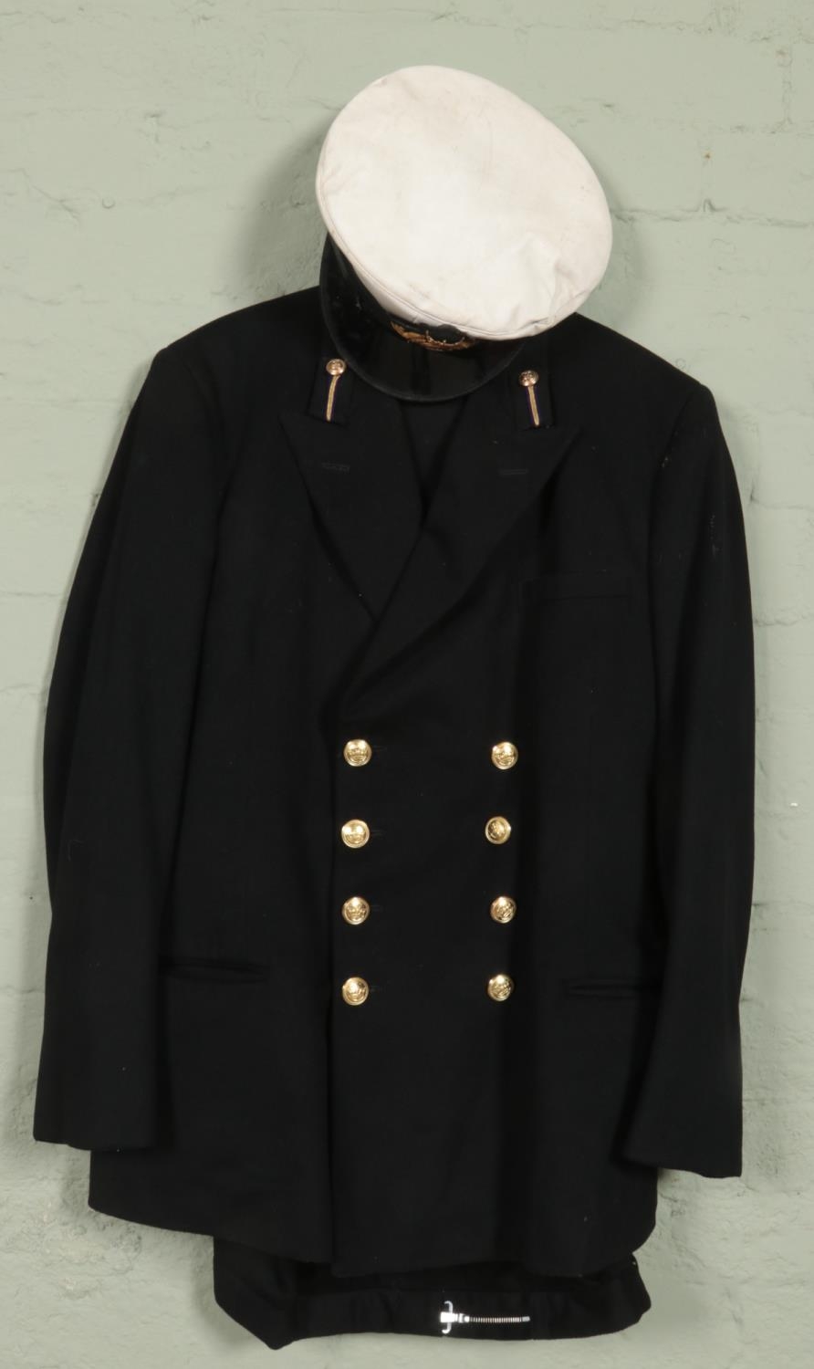 A merchant navy captains peak cap along with jacket and trousers.