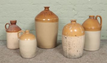Five stoneware flagons, including advertising examples for A. Bentley & Son, Doncaster and J & G