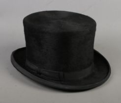 A vintage gentleman's top hat, size 6 7/8.
