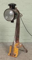 An industrial style upcycled lamp, with adjustable head, bracket base and spanner feet. Height: