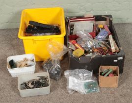 Two boxes of assorted model railway spares and repairs to include wheels, electrics, turnout