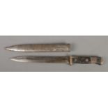 A German World War Two K98 bayonet with scabbard. Blade length 24.5cm. CANNOT POST OVERSEAS