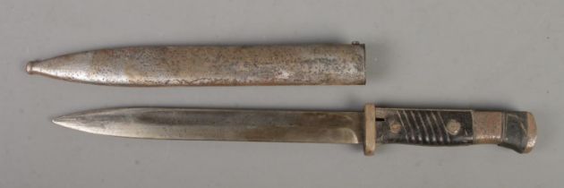 A German World War Two K98 bayonet with scabbard. Blade length 24.5cm. CANNOT POST OVERSEAS