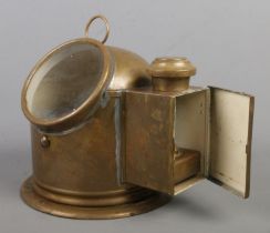 A Sestral brass binnacle/gimbal compass, complete with burner.