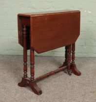 A small Regency style mahogany Sutherland table.