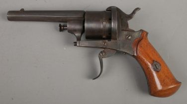 A late Nineteenth Century Belgian six-shot pin fire revolver, with octagonal barrel. Bearing Belgian