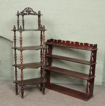 Two Victorian style mahogany what not stands.