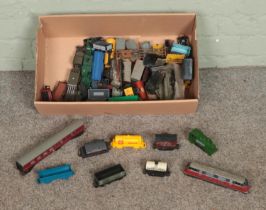 A box of model railway, mostly OO Gauge, rolling stock to include Bachmann, Tri-Ang, Hornby, etc.