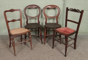 Seven antique chairs. Includes rush seat hall chair, pair of balloon backs, rocking chair etc.