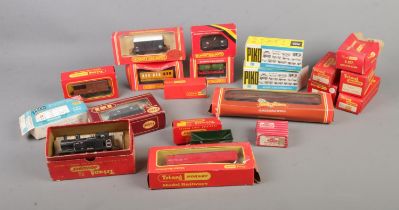 A collection of boxed model railway carriages and accessories to include Hornby, Tri-Ang, Peco,