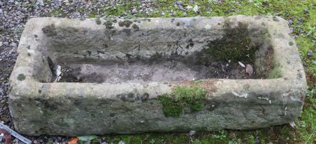 A large stone trough. (H24cm x W102cm x D40cm)