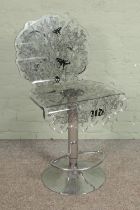 A Perspex bar stool/make up chair with chromed pedestal by Urban Decay.