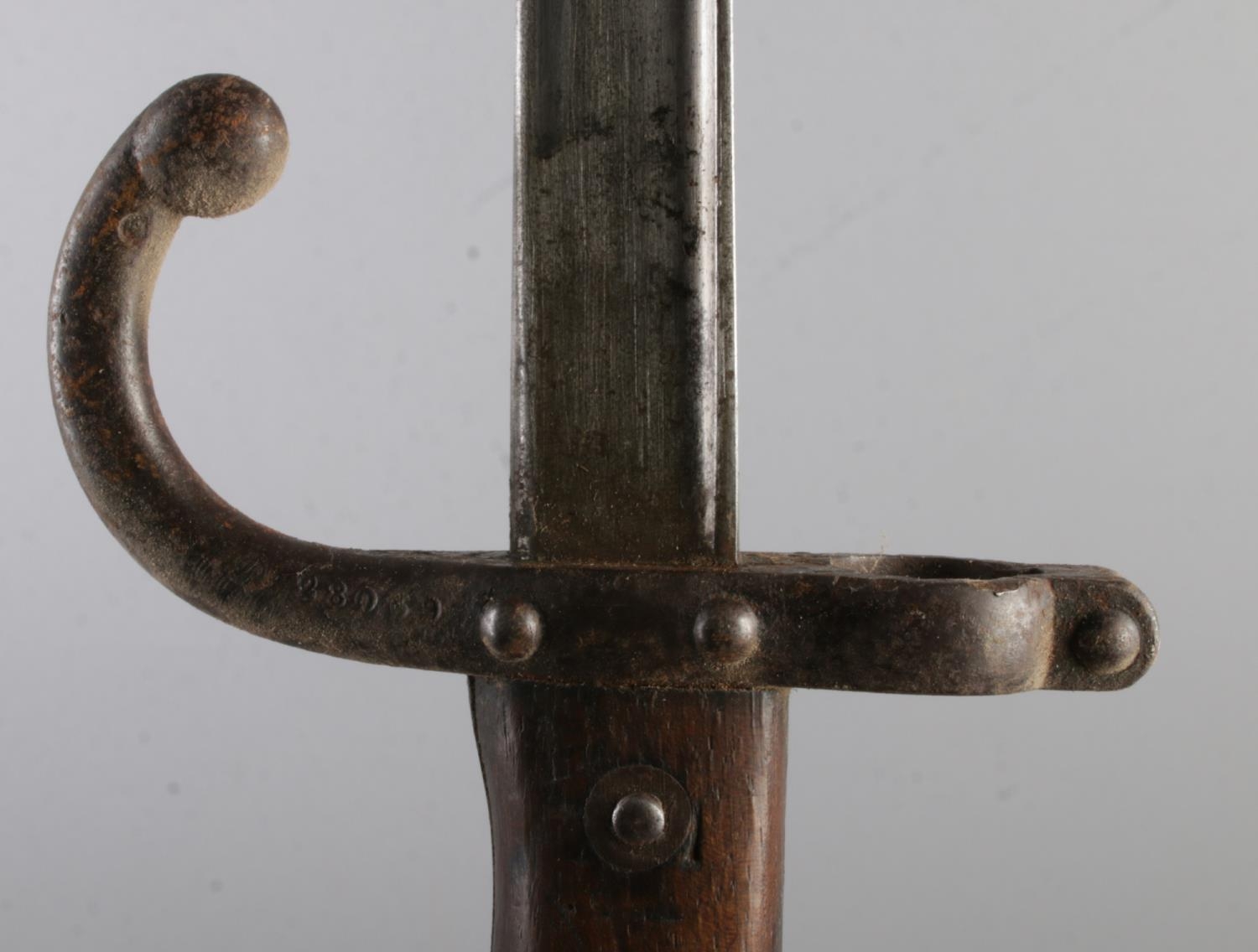 A French 1874 bayonet with scabbard. Inscribed to edge of blade and dated 1878. Blade length 52cm. - Image 3 of 4