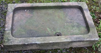 A large concrete shallow trough. (H19cm x W108 x D61cm)