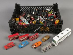 A box of diecast vehicles. Includes Corgi, Matchbox, etc.