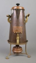 A copper and brass coffee pot, with burner and trivet. Labelled for Ash's Kaffeekanne,