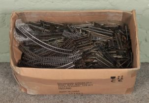 A large box of Hornby OO Gauge railway track.