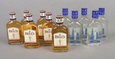 Six 20cl bottles of Bell's Whisky along with five 200ml bottles of New Amsterdam Vodka.