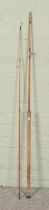 A vintage Lindop split cane two piece fishing rod.