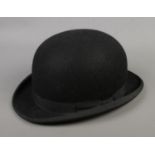A Lock & Co Hatters, St. James' Street black bowler hat.