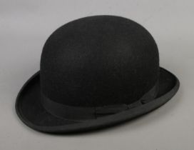 A Lock & Co Hatters, St. James' Street black bowler hat.