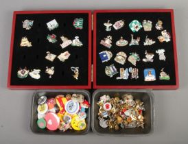 A collection of over 100 pin badges including a cased set of Gary Patterson pin badges.