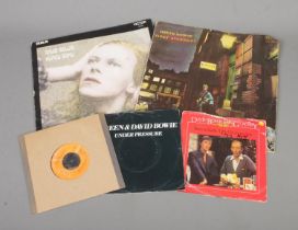 A collection of David Bowie vinyl records and singles to include 1st pressing of 'The Rise and