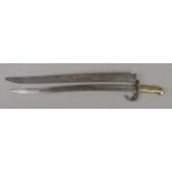 A French M1866 bayonet with scabbard. Blade inscribed to edge and dated 1868. Blade length 57cm.